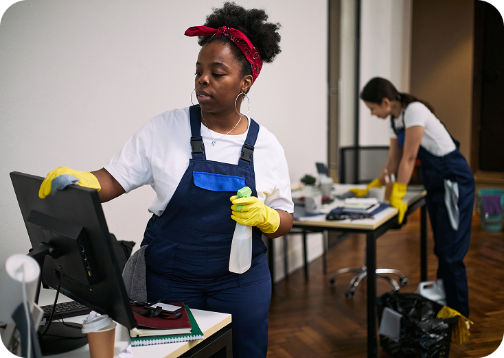 Office cleaners wearing yellow gloves