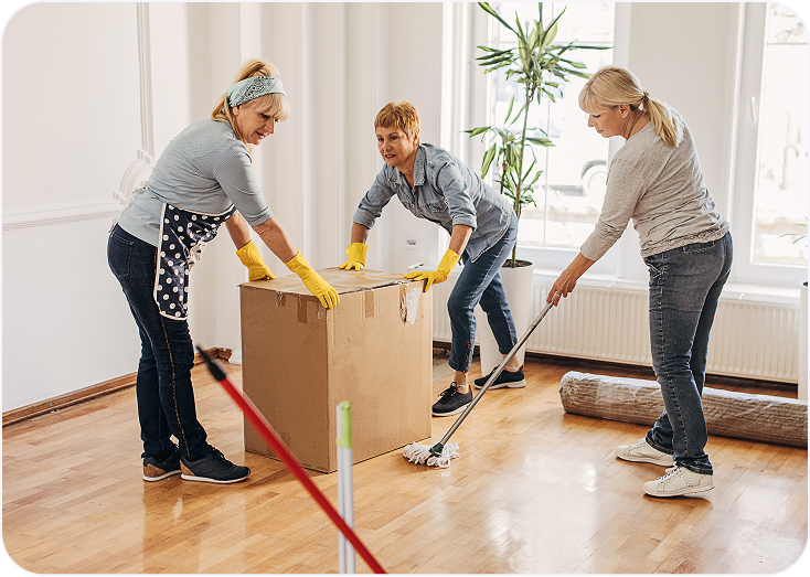 Team cleaning the wooden floor
